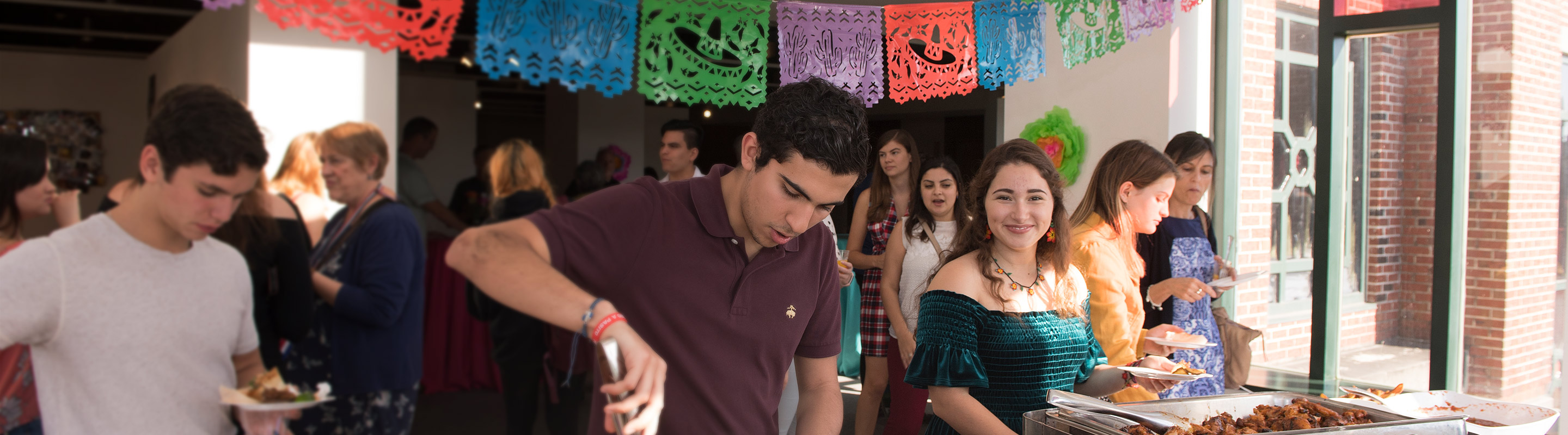Students hosting international buffet