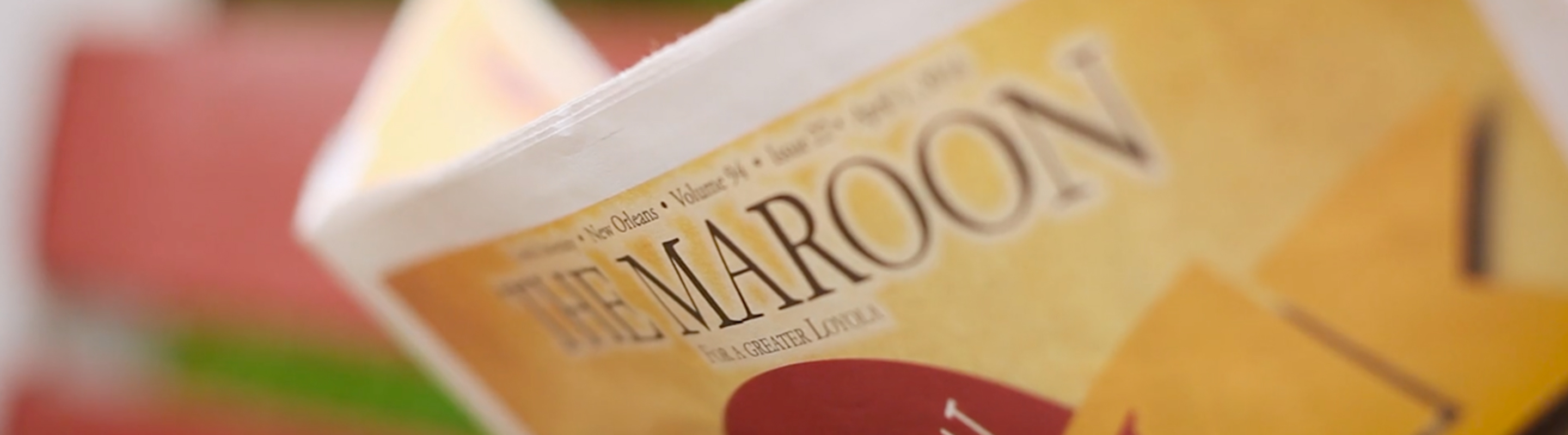 Close up of the maroon newspaper