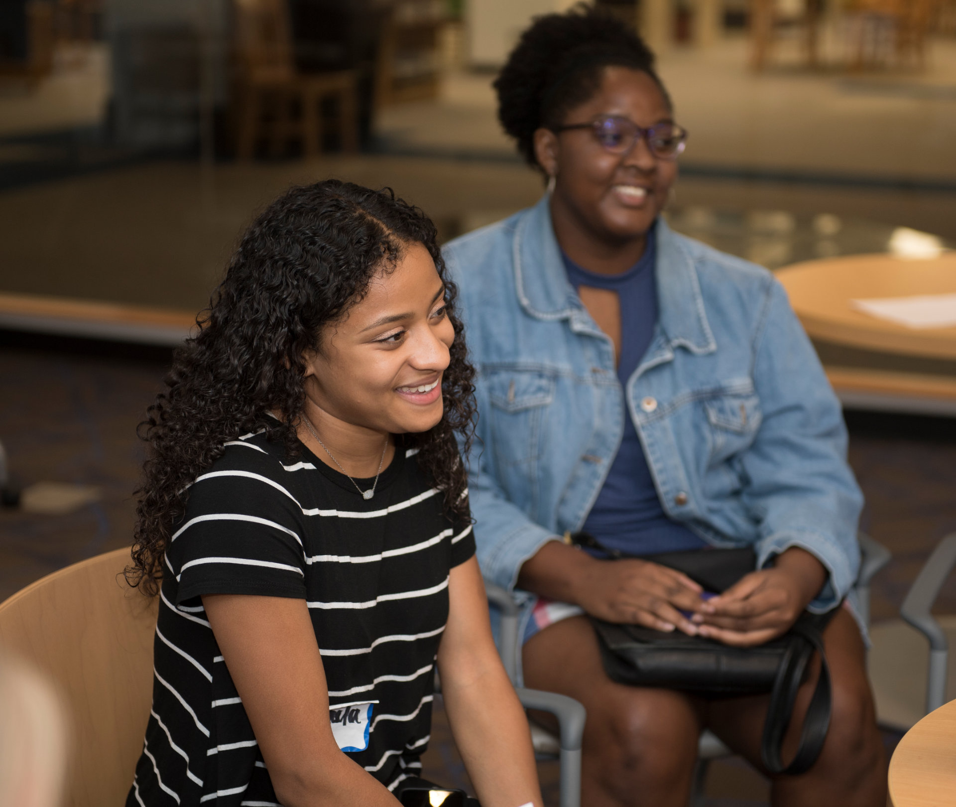 Young women smiling at retreat