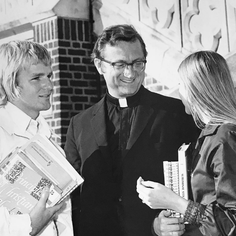 Old photo of Fr. Carter with students