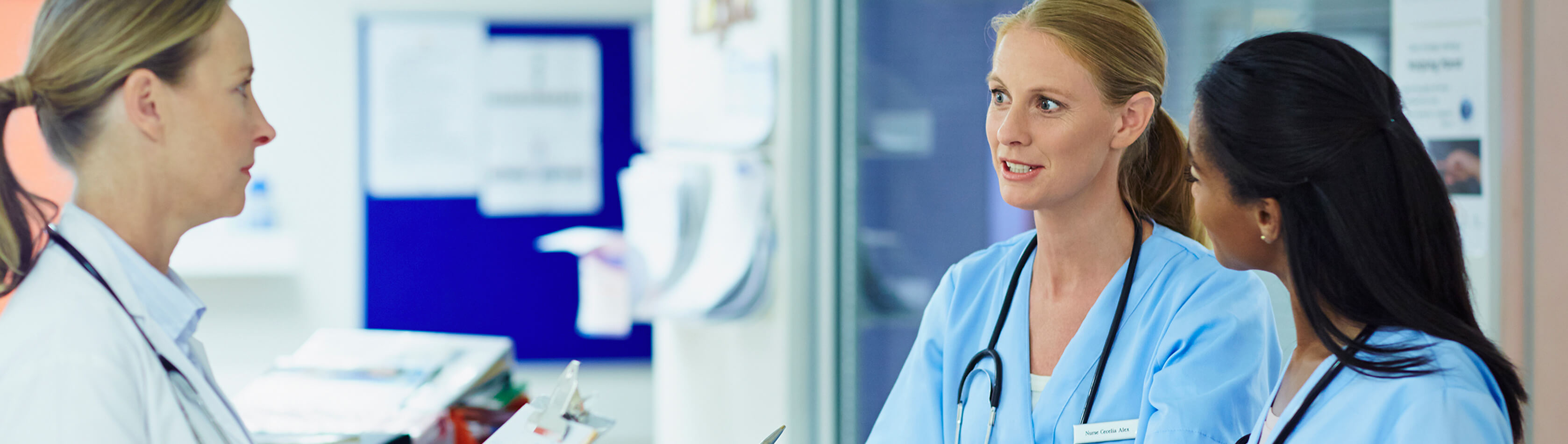 online bsn students standing in a semi circle.