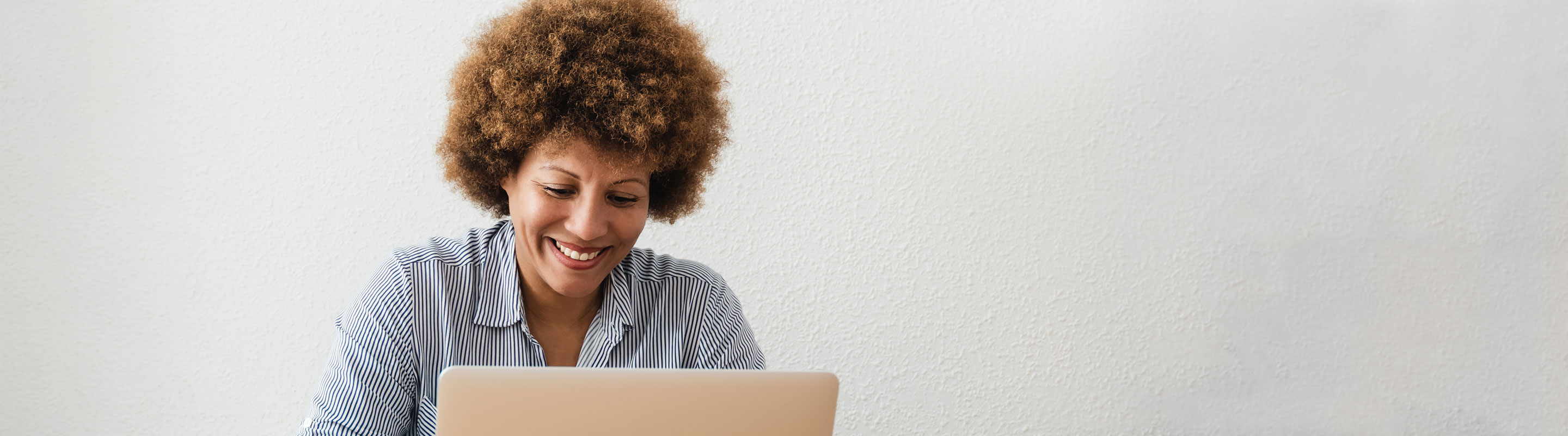 Loyola Online Student at Computer