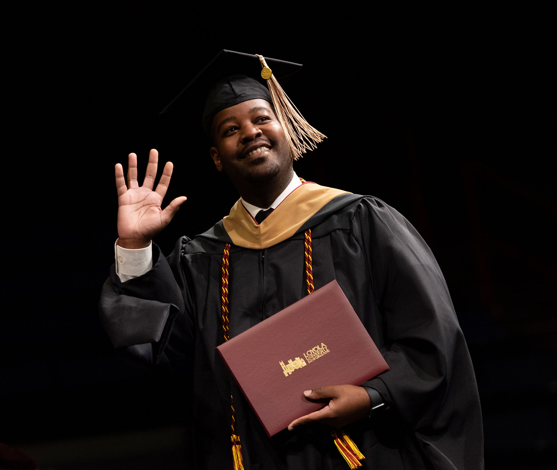 Loyola Online Graduate With Degree