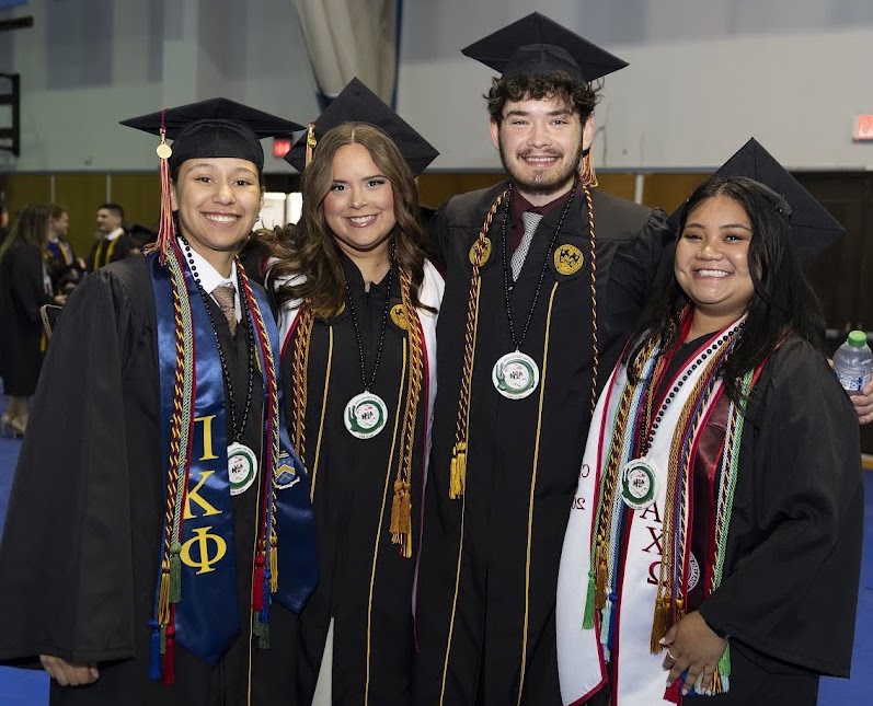 Four Loyola Graduates.