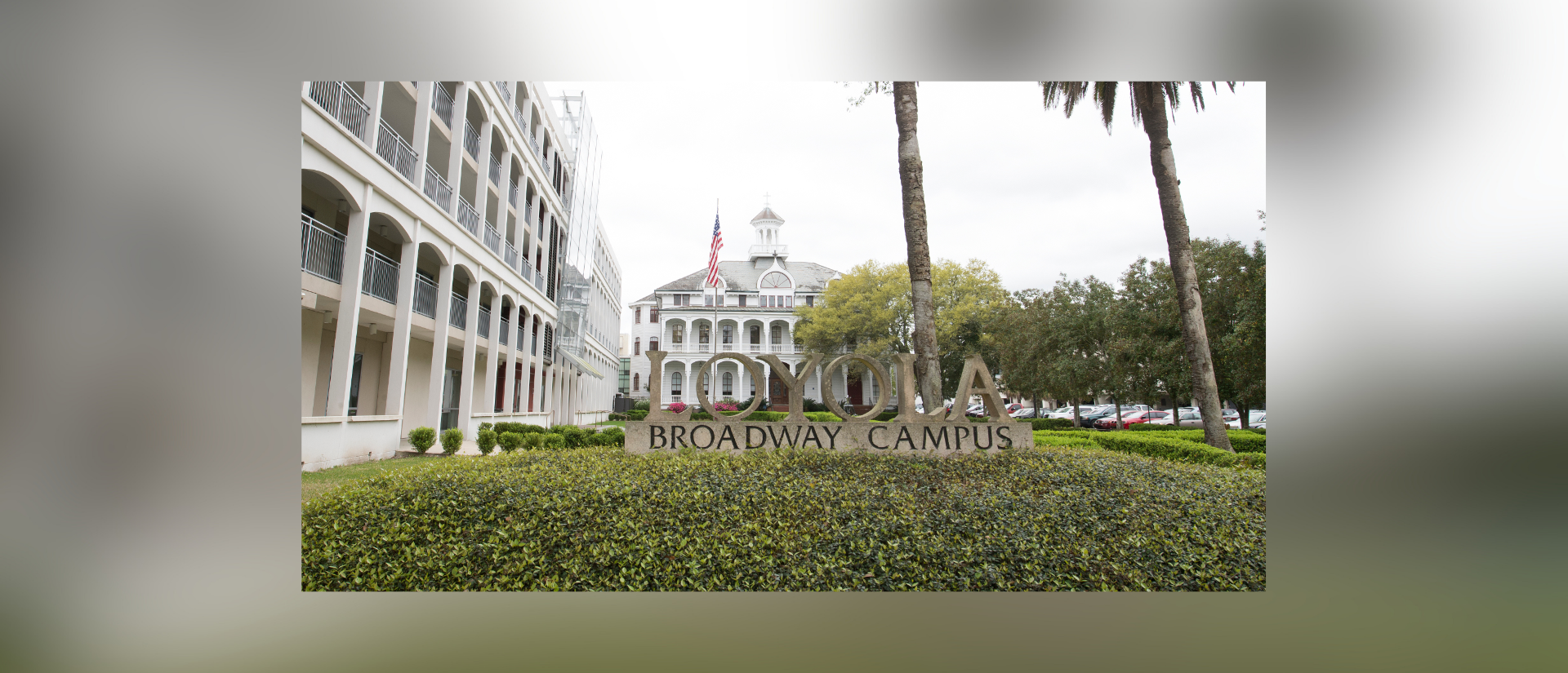 A photo of the Loyola University New Orleans Broadway campus sign.